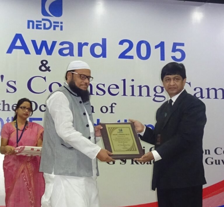 M Hoque aka Mahbubul Hoque receiving NEDFi Award